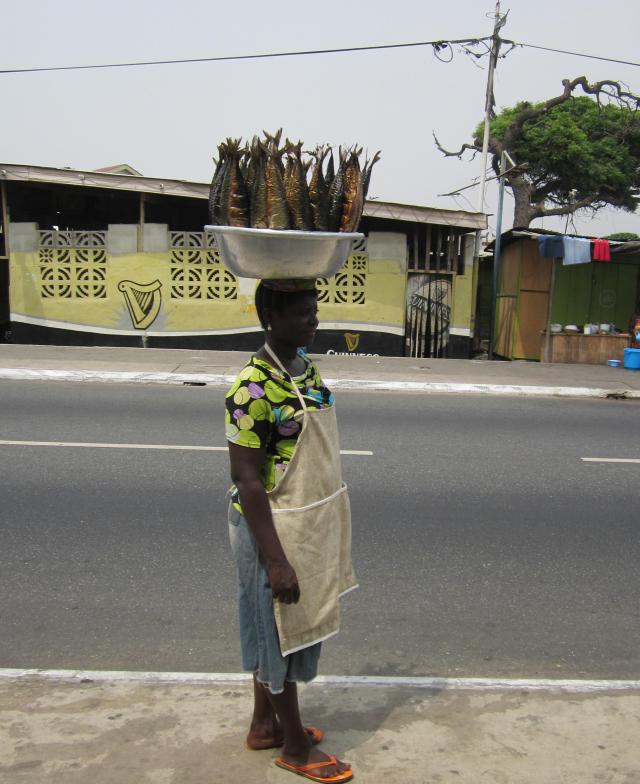 Carrying mackerel past Guinness in Usshertown