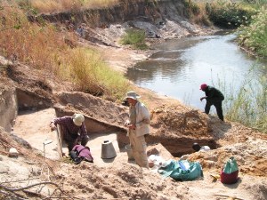 Japanese dating specialist taking samples watched by Anthro-man, Collins in background (green & blue duffel bag is one of our Isles of Scilly sailcloth Ratbags btw)