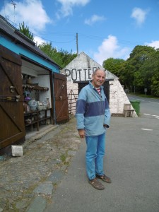 Oldrich asenbryl outside his shop in Sarn